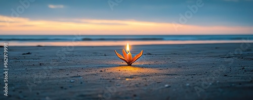 A solitary candle flickering in the wind on a desolate beach, fragility, the endurance of hope amidst despair