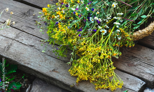 Wildflowers Overflowing Basket Wooden Texture Close-Up