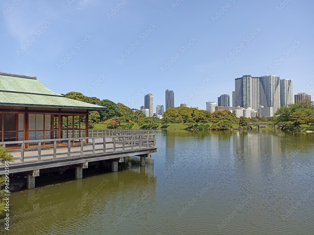 Hamarikyu Gardens surrounded by skyscrapers of Shiodome Section in Tokyo, Japan Hamarikyu Gardens surrounded by skyscrapers of Shiodome Section in Tokyo, Japan