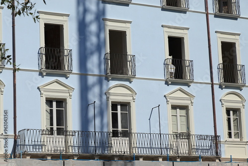 Piazza 4 Novembre Square Building Facade with Iron Balcony in Antrodoco, Italy photo