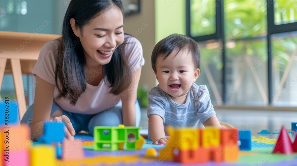 Smiling Mother and Baby Playing with Toys at Home