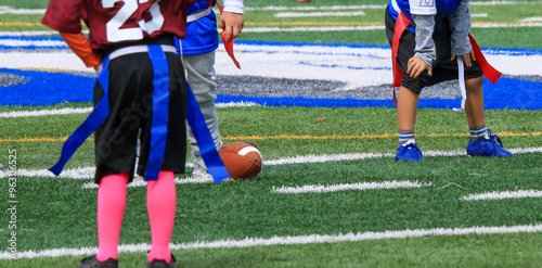 Youyh boys playing flag football photo