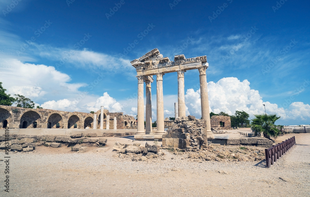 The ancient Temple of Apollo ruins in Side, Turkey, standing majestically by the Mediterranean Sea. The image captures the iconic columns of the temple
