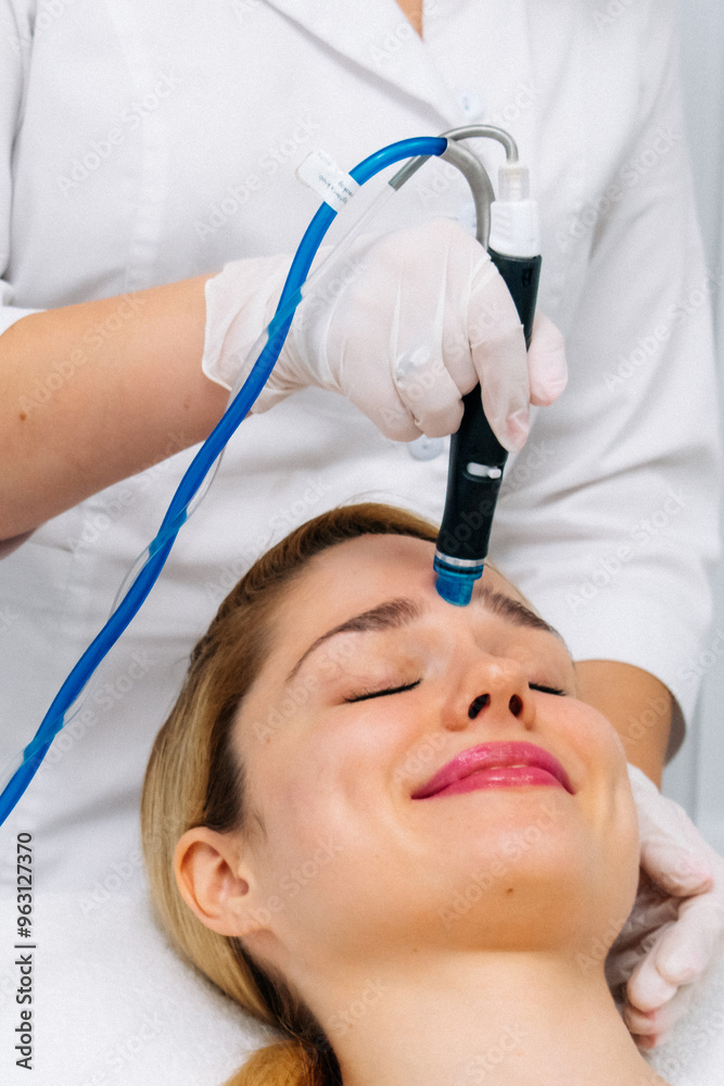 custom made wallpaper toronto digitalRelaxing beauty treatment in a modern cosmetic clinic. Woman enjoying a hydrolifting procedure, achieving radiant and youthful skin. Perfect for showcasing advanced skincare solutions.