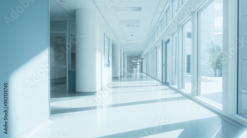 Modern Hospital Corridor with Sunlight Streaming Through Windows