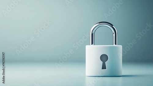 Minimalist closeup of a padlock symbolizing security and protection against a blue background. Perfect for business and technology contexts. photo