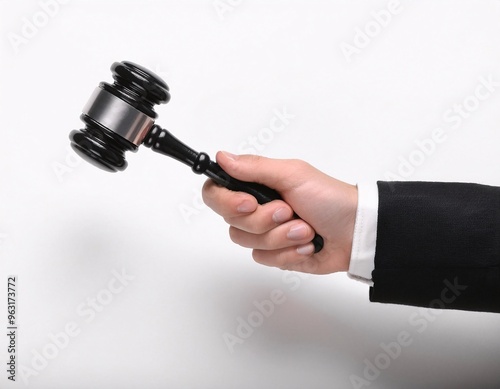 The hand holding the hammer of justice symbolizes law, power and authority in carrying out justice. generative ai