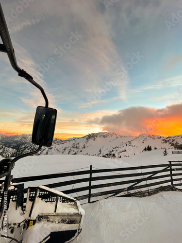 Evening grooming snow in a snow cat at sunset