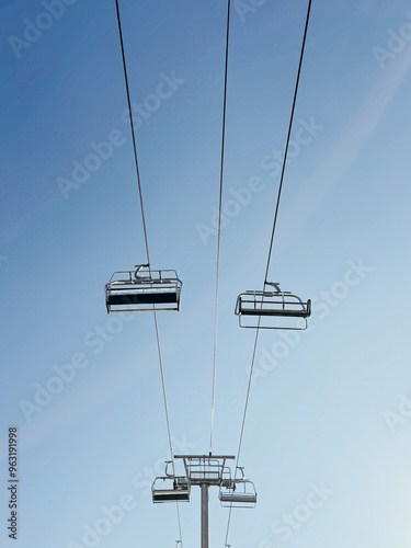 Chairlift in blue skies