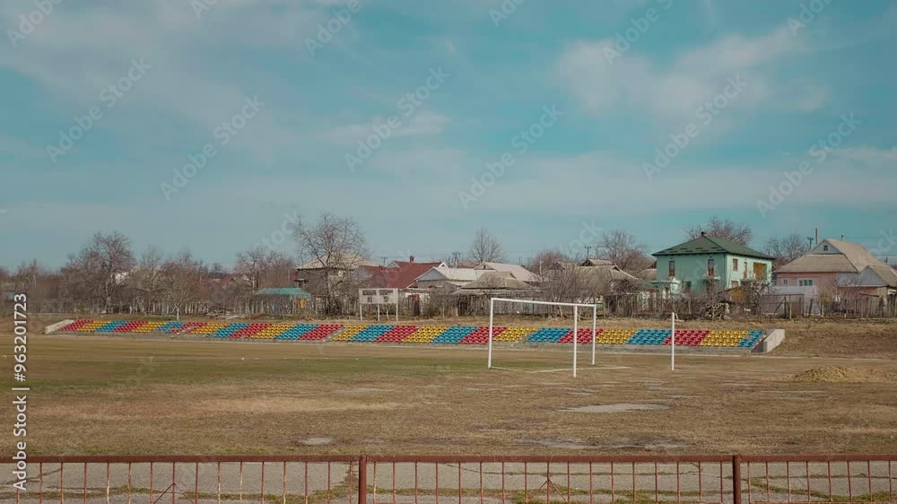 Village football field felt to rust and ruin. Neglected soccer field football gate with corrosion and netless. Village football field felt to rust and ruin. Neglected soccer field football gate with corrosion and netless.