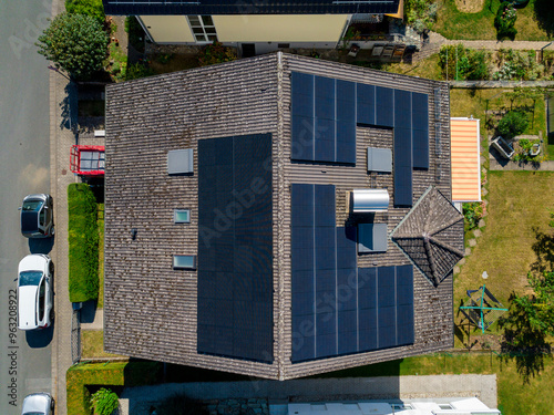 Top down solar panels on private roof tops in Germany on a summer day