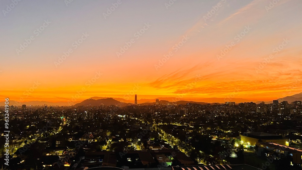 Fototapeta premium sunset in the city of Santiago. sunrise in the city. Beautiful sunset over city. Sunset and city scape in Santiago Chile.