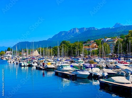 Bild auf Leinwand boats in the harbor of Evian les Bains on lake Geneva