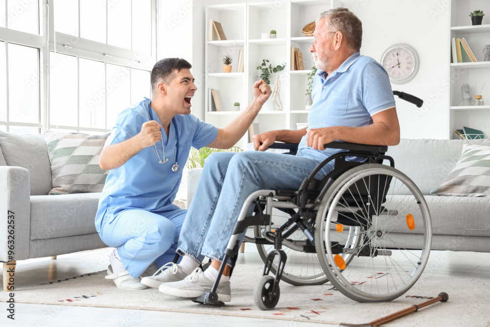 Senior man in wheelchair scared of angry nurse at home Senior man in wheelchair scared of angry nurse at home