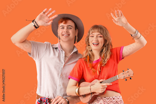 Couple of hippies with ukul...