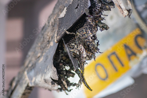 Photo of the texture of black carbon fiber. Carbon dark background of rectangular. Black sports film for pasting cars. military carbon fiber. Detail of a crashed military drone carbon fiber honeycombs
