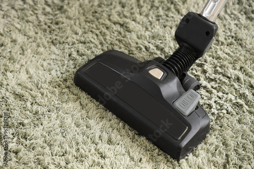 Vacuum cleaner head on shag...