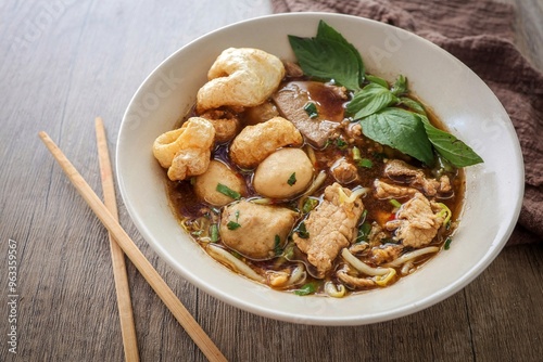 Noodle soup with sliced pork, pig blood, bean sprouts and Thai morning glory., thai called Kway Tiew Moo Nam Tok photo