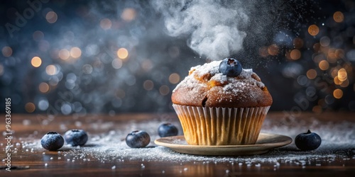 Steaming blueberry muffin with powdered sugar on dark bokeh background