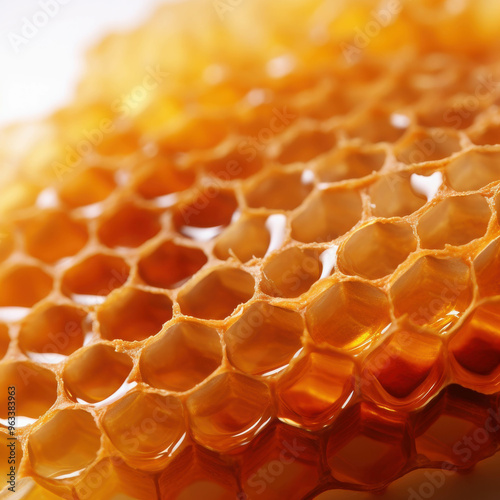 Golden Nectar: A macro close-up of glistening honeycomb, capturing the intricate beauty and natural perfection of nature's golden treat. 