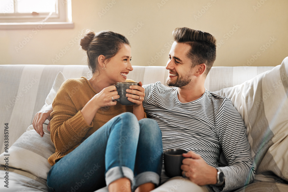 Relax, coffee or happy couple laughing on sofa with smile or love in house for care, latte and bonding. Apartment, break and people drinking tea beverage on couch together to chill in lounge in Spain Relax, coffee or happy couple laughing on sofa with smile or love in house for care, latte and bonding. Apartment, break and people drinking tea beverage on couch together to chill in lounge in Spain