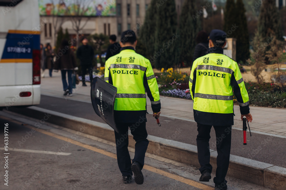 Naklejka premium Korean police squad formation in protective uniform with 