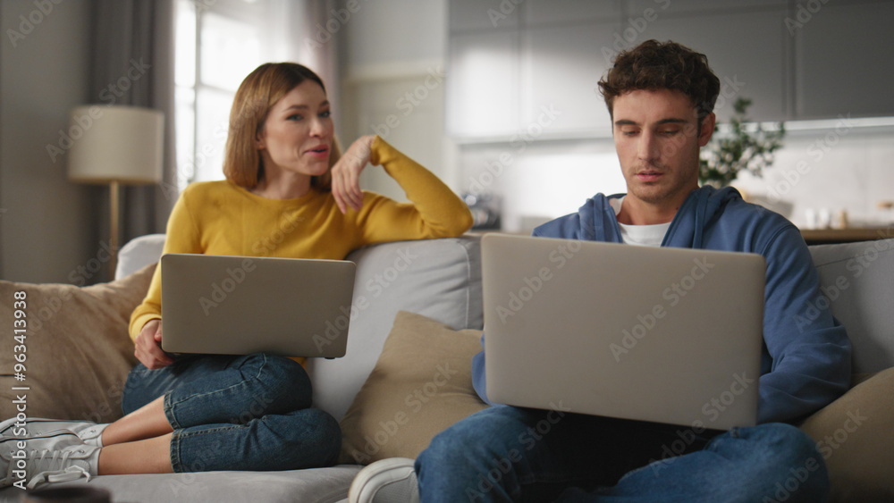 Excited woman looking man computer asking at home closeup. Couple lifestyle Excited woman looking man computer asking at home closeup. Couple lifestyle