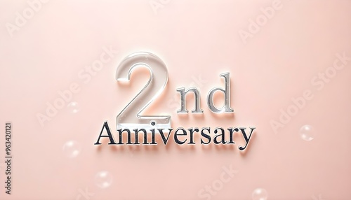 2nd Anniversary letter manipulation with transparent soap bubbles floating on a soft  background
