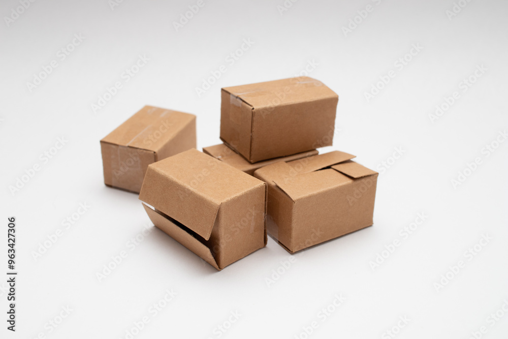 Fototapeta premium Stack of cardboard boxes delivery service on white background