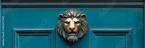 A close-up shot of a decorative brass lion head door knocker mounted on a teal blue door. The lion's head is intricately detailed, with a regal expression and a flowing mane. This door knocker symboli