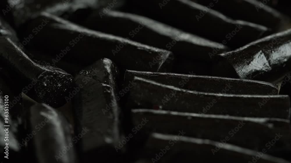 Liquorice sweets candy background rotating macro. Sweet treats.