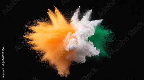 A vibrant and dynamic image of orange, white, and green powder exploding against a black background.  The colors represent the Ivory Coast flag, symbolizing unity, peace, and hope. This striking visua photo