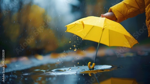 Wallpaper Mural Yellow Umbrella Dripping Water Into Puddles on a Rainy Day Torontodigital.ca