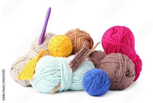 Different yarns, pattern samples and crochet hooks isolated on white