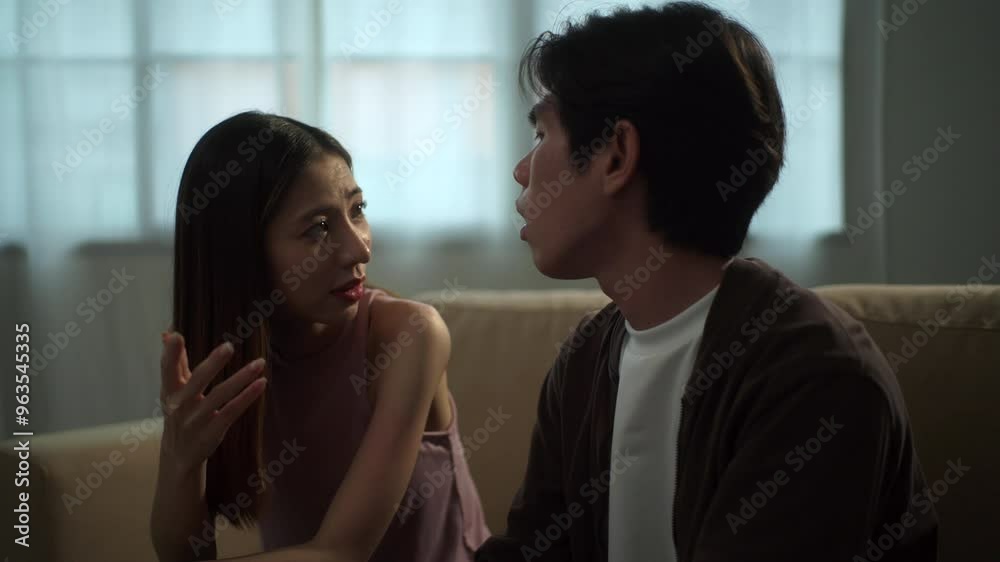 Stressed asian couple having argument with misunderstand at home, young couple having fight in living room, depression and mental health on family conflict problem concept.
Stressed asian couple having argument with misunderstand at home, young couple having fight in living room, depression and mental health on family conflict problem concept.