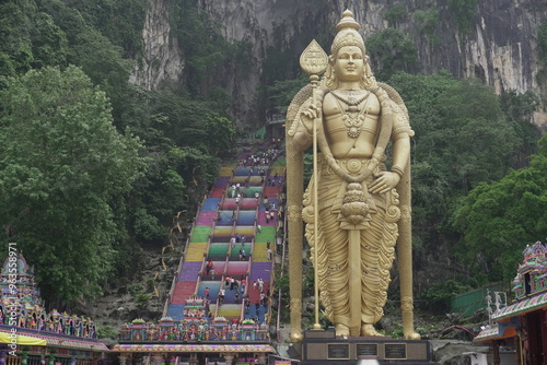 Lord Murugan Statue and Colorful Stairs at Batu Caves, Gombak, Selangor, Kuala Lumpur Malaysia photo