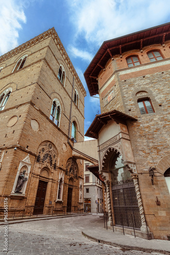 Wallpaper Mural Orsanmichele - the Gothic architecture of Florence's historic plague church under a cloudy sky. Florence, Tuscany. Torontodigital.ca