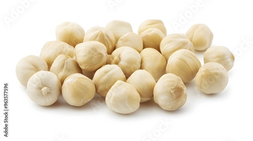 ealistic spread of blanched hazelnuts on a white background, showcasing their smooth, round shape and pale, off-white color with soft highlights