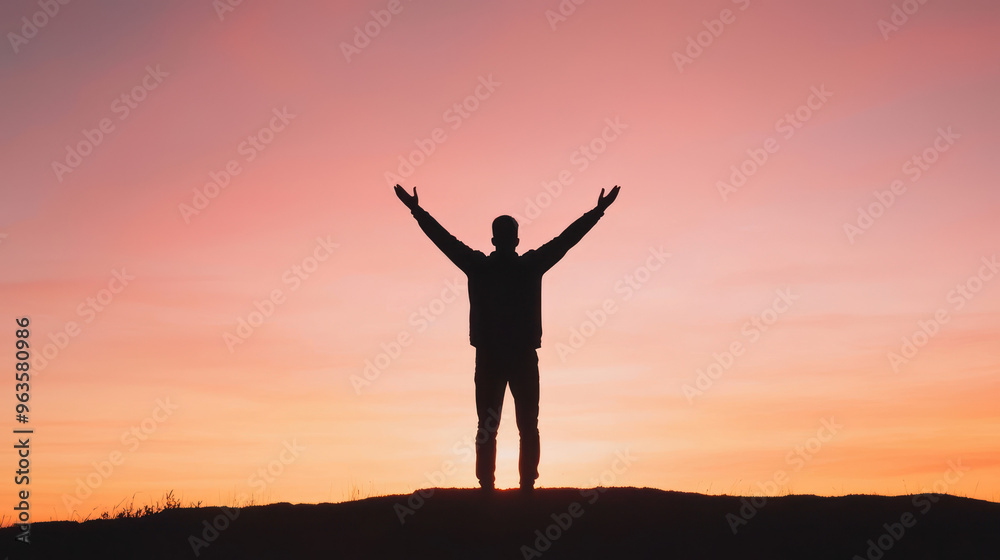 A silhouetted figure stands with arms raised, celebrating against a vibrant sunset sky filled with hues of orange and purple. high quality A silhouetted figure stands with arms raised, celebrating against a vibrant sunset sky filled with hues of orange and purple. high quality