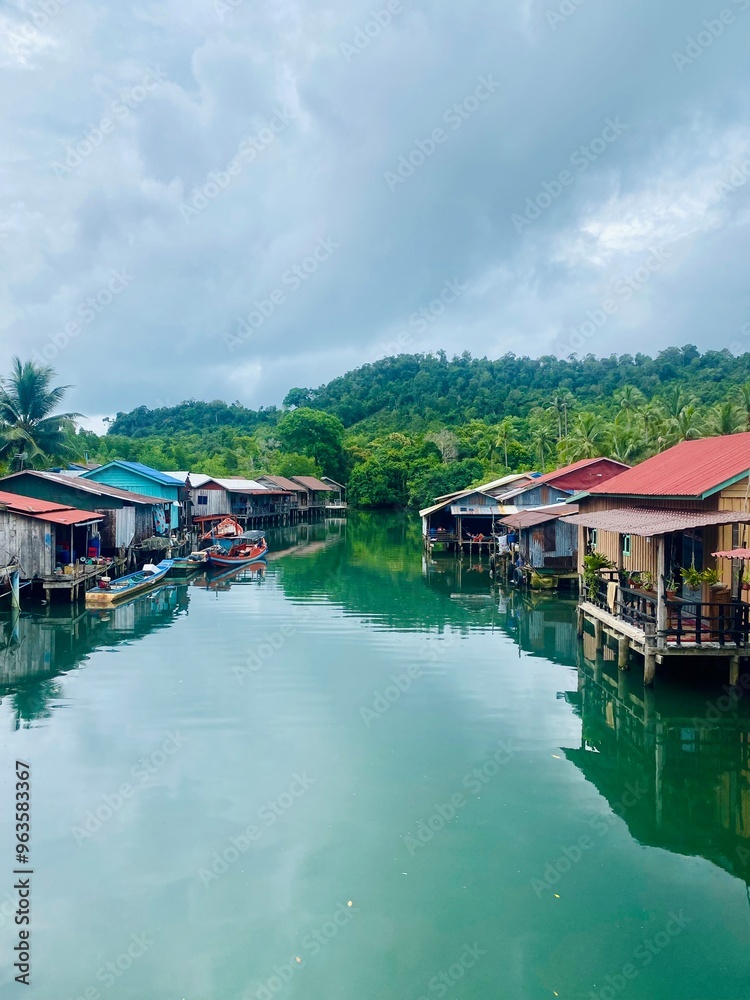 Traditional Fishermen’s Houses on Stilts in a Small Village on Koh Rong, Cambodia Traditional Fishermen’s Houses on Stilts in a Small Village on Koh Rong, Cambodia
