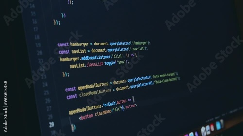 Side view of JavaScript coding with Copilot
