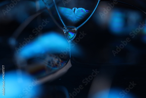 Blue reflections of liquid in macro, black and silver colors, rainbow, Black and silver bubbles in macro, connection of bubbles in macro, cell from liquid, molecules connection, fluid art