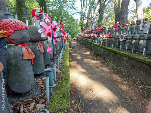 The Jizo Statues of the souls of unborn children by Zojo-ji Temple in Minato Ward, Tokyo, Japan photo