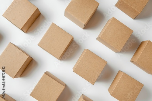 A collection of brown boxes placed on a clean and flat white surface