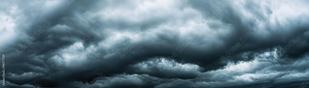 Overcast sky with dark clouds threatening rain, gloomy weather, moody atmosphere Overcast sky with dark clouds threatening rain, gloomy weather, moody atmosphere