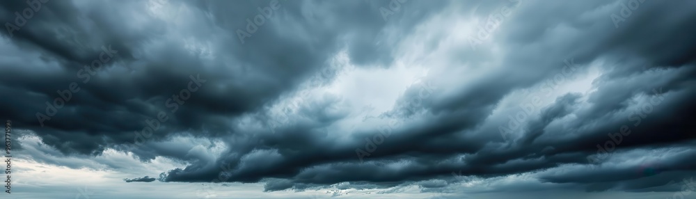Overcast sky with dark clouds threatening rain, gloomy weather, moody atmosphere Overcast sky with dark clouds threatening rain, gloomy weather, moody atmosphere
