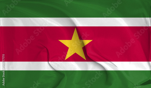 An up close view of Suriname flag flying textures