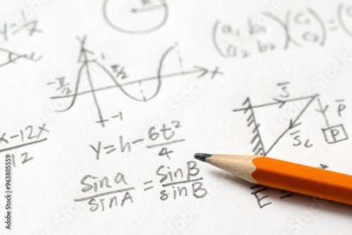 Mathematical Equations and Graph with Pencil photo