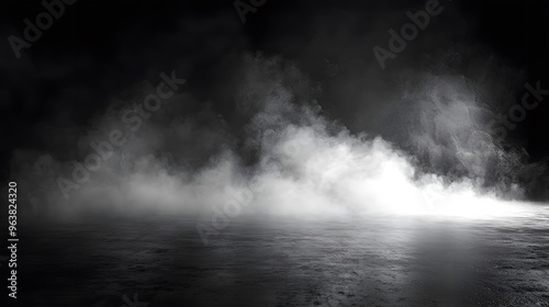 Mysterious mist covers a dark, reflective surface. photo