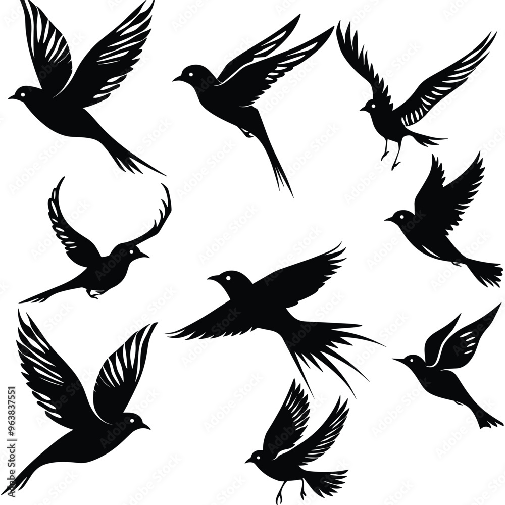 Obraz premium Silhouettes of various birds in flight against a white background.